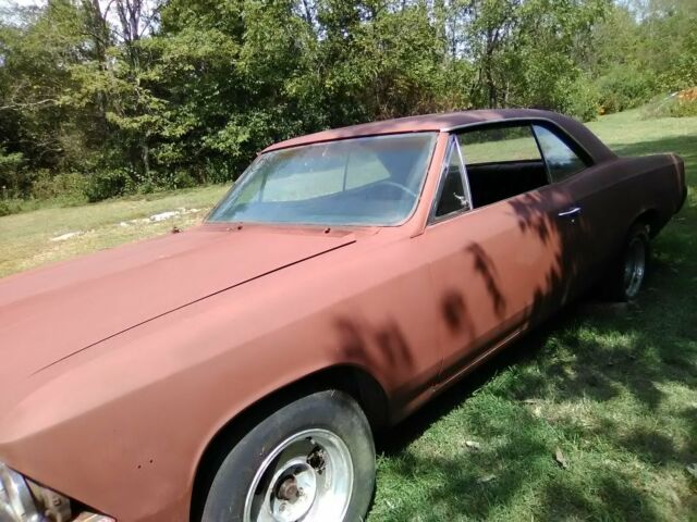 1966 black Chevrolet Chevelle Coupe