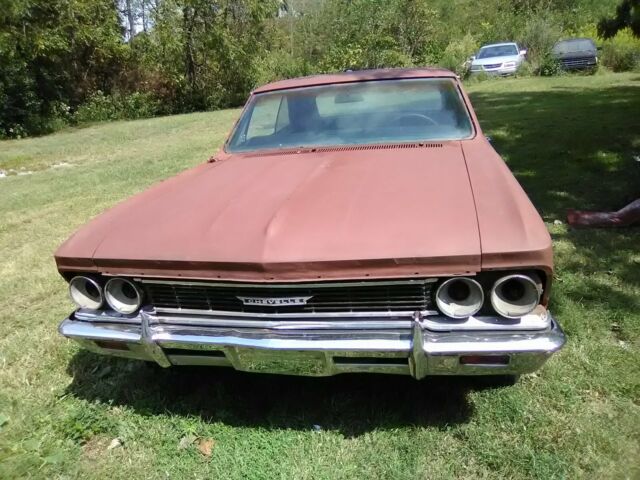 1966 black Chevrolet Chevelle Coupe