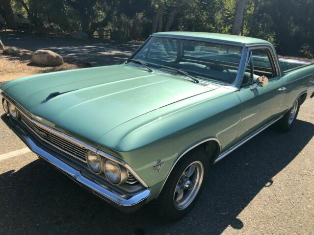 1966 green Chevrolet El Camino cab pick up