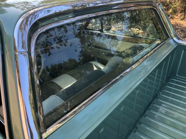 1966 green Chevrolet El Camino cab pick up