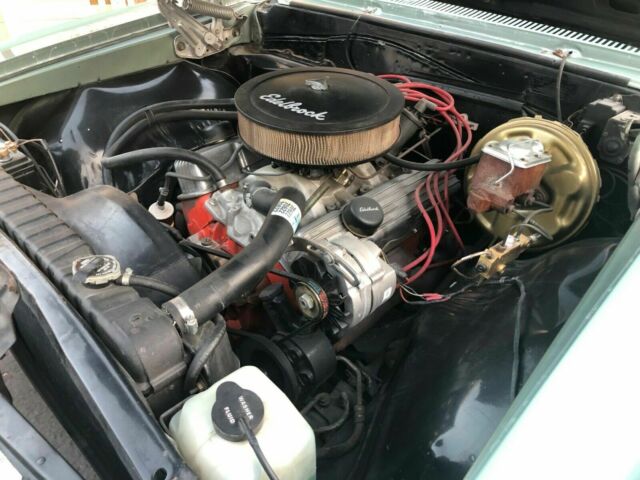 1966 green Chevrolet El Camino cab pick up