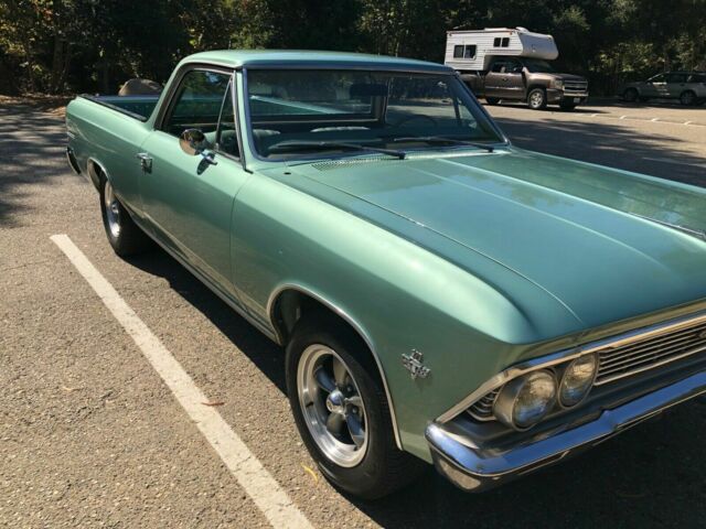 1966 green Chevrolet El Camino cab pick up