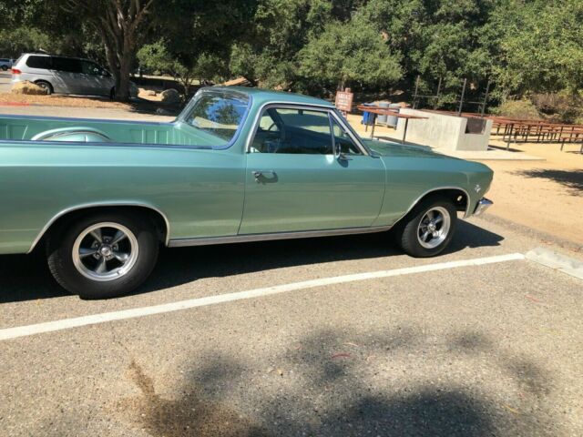 1966 green Chevrolet El Camino cab pick up