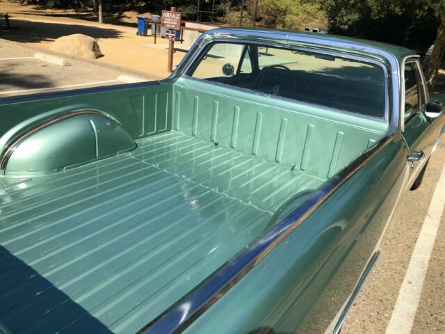 1966 green Chevrolet El Camino cab pick up