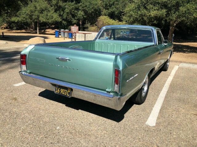 1966 green Chevrolet El Camino cab pick up