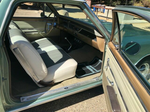 1966 green Chevrolet El Camino cab pick up