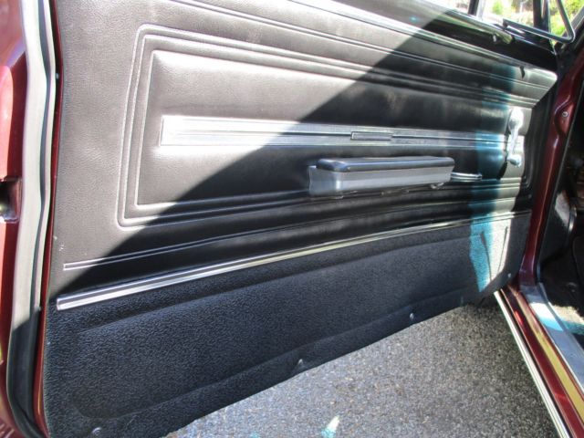 1966 maroon Chevrolet Chevelle Convertible