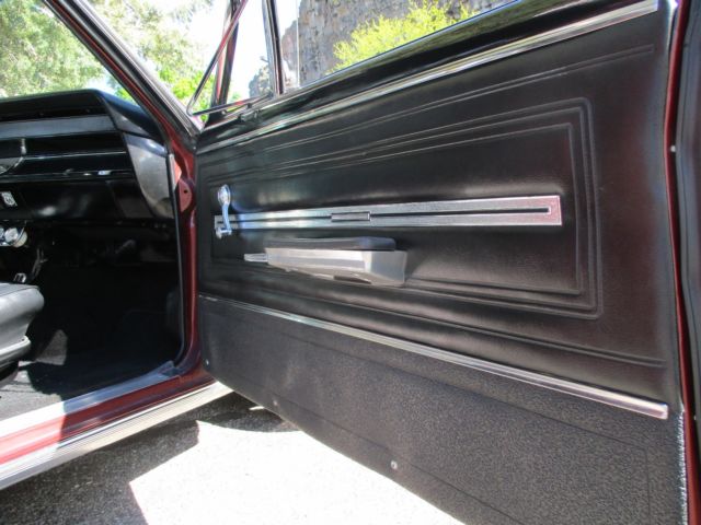 1966 maroon Chevrolet Chevelle Convertible