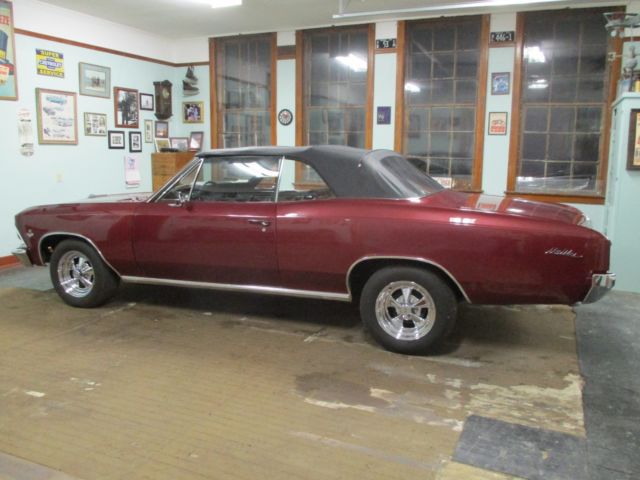 1966 maroon Chevrolet Chevelle Convertible