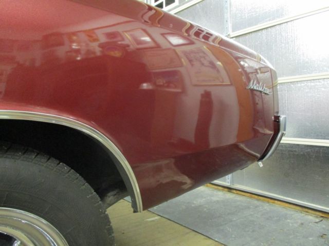 1966 maroon Chevrolet Chevelle Convertible