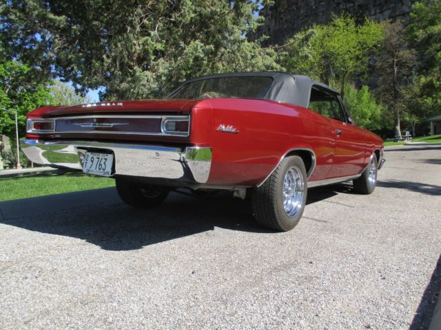 1966 maroon Chevrolet Chevelle Convertible