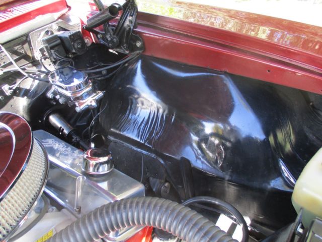 1966 maroon Chevrolet Chevelle Convertible