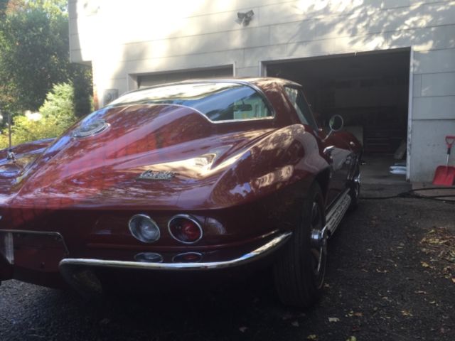 1966 maroon Chevrolet Corvette Coupe