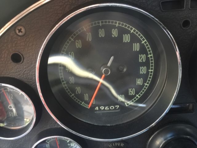 1966 maroon Chevrolet Corvette Coupe