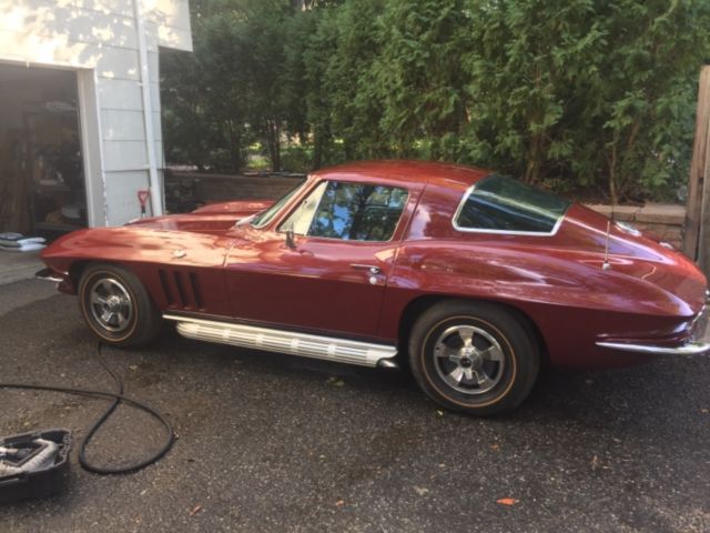 1966 maroon Chevrolet Corvette Coupe