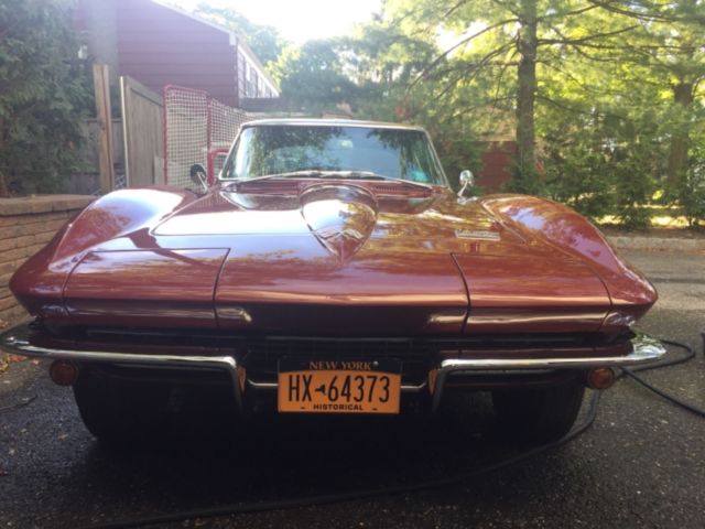 1966 maroon Chevrolet Corvette Coupe