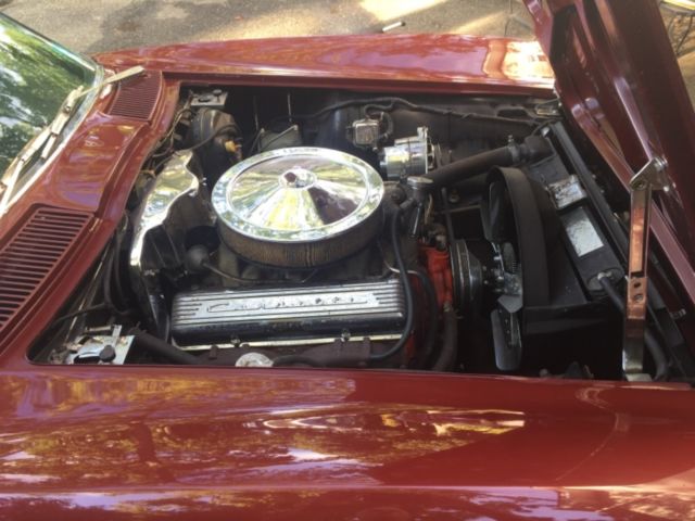 1966 maroon Chevrolet Corvette Coupe