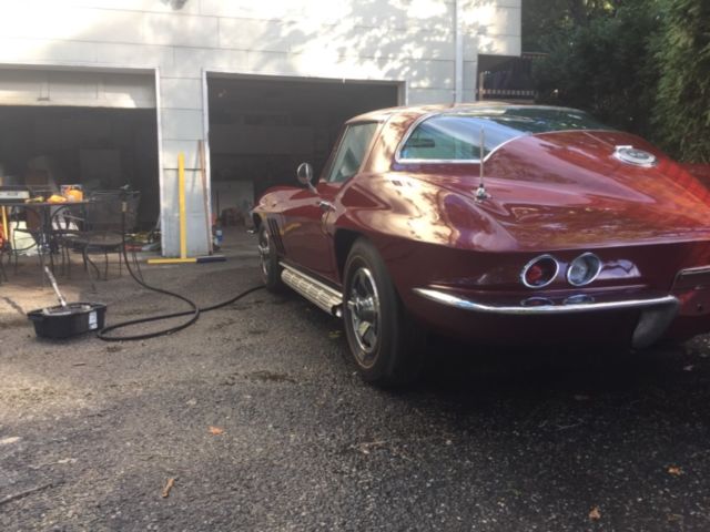 1966 maroon Chevrolet Corvette Coupe