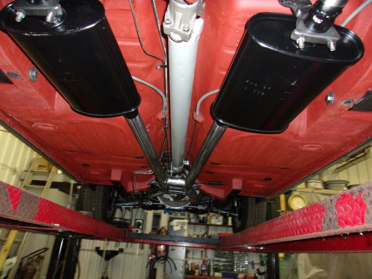 1966 turquoise Ford Mustang