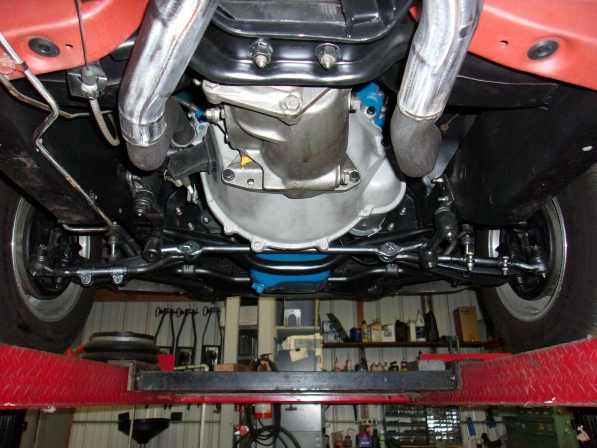 1966 turquoise Ford Mustang