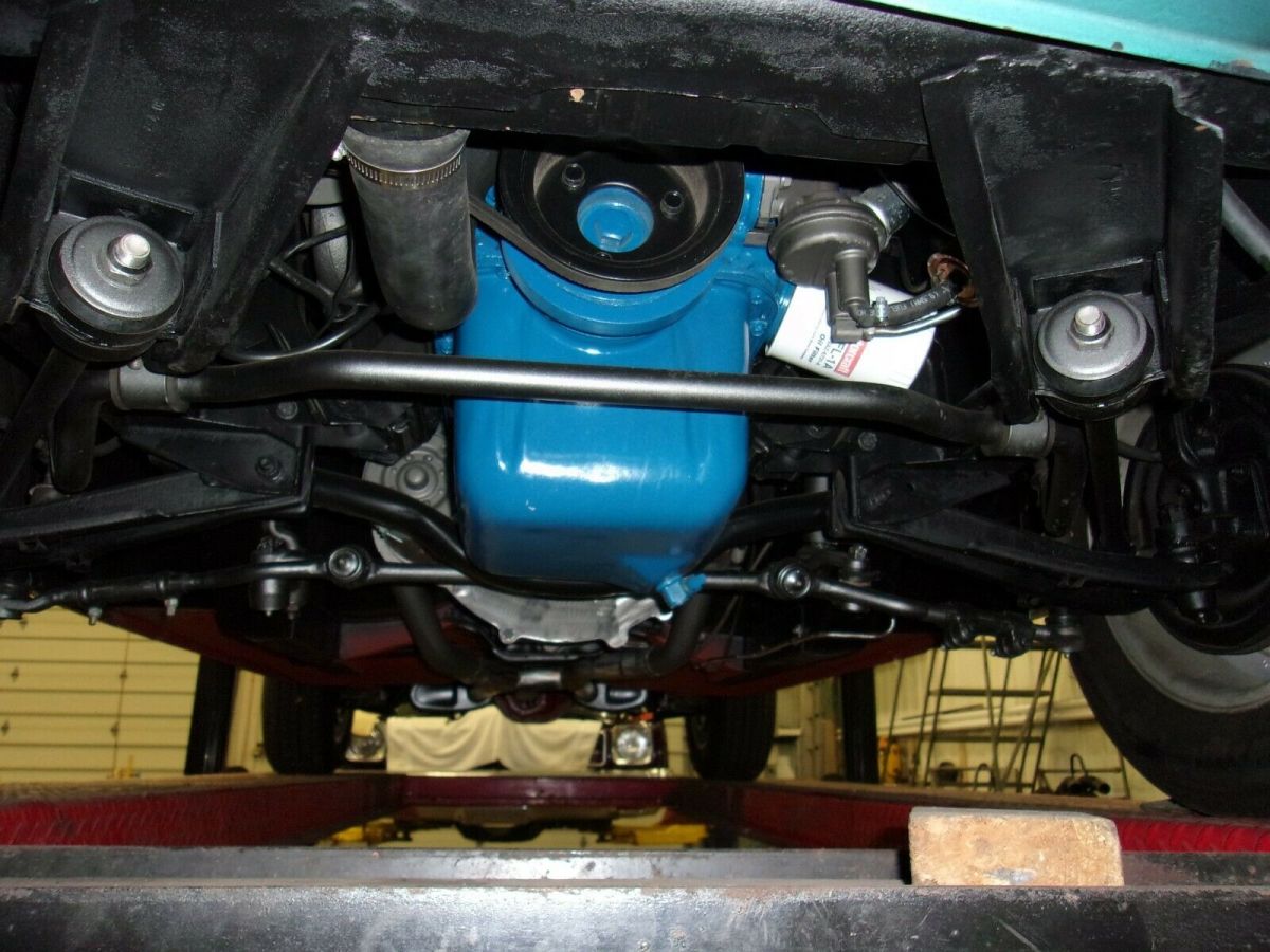 1966 turquoise Ford Mustang