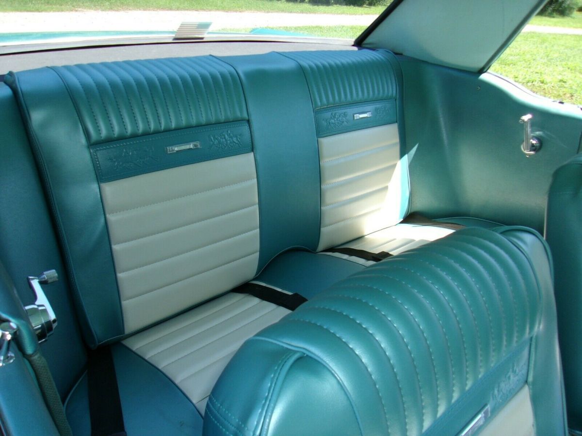 1966 turquoise Ford Mustang