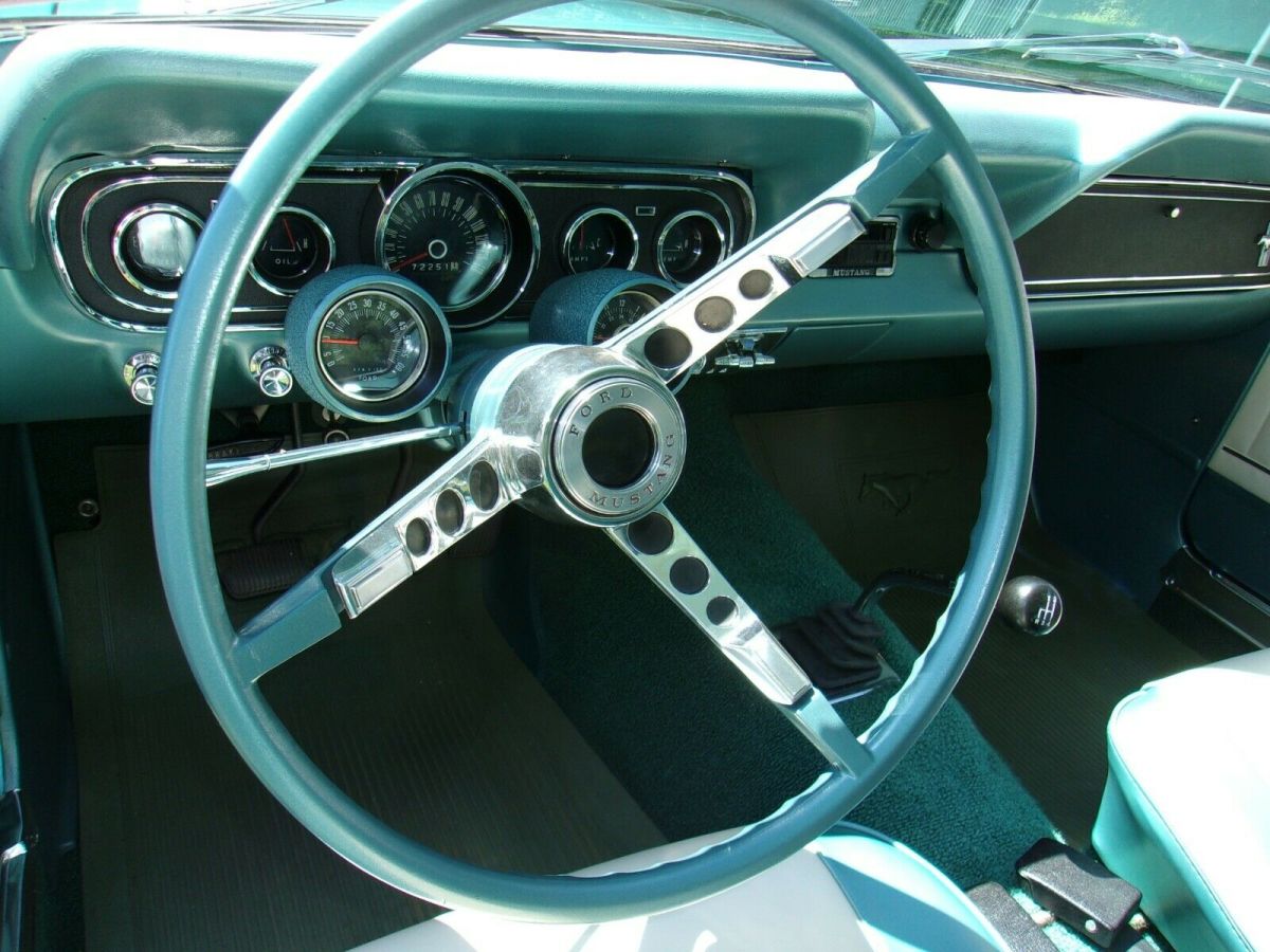1966 turquoise Ford Mustang