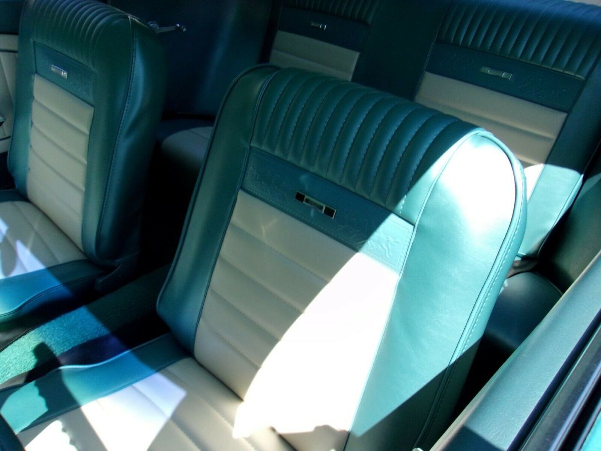 1966 turquoise Ford Mustang