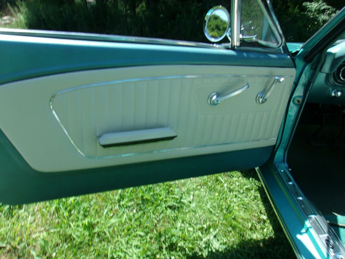 1966 turquoise Ford Mustang