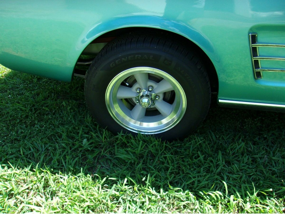 1966 turquoise Ford Mustang