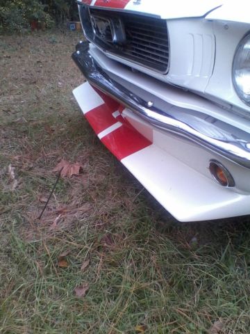 1966 pearl white with red stripes Ford Mustang Coupe