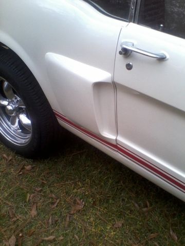 1966 pearl white with red stripes Ford Mustang Coupe