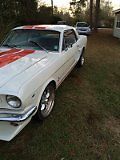 1966 pearl white with red stripes Ford Mustang Coupe