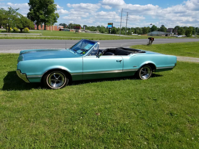 1966 Blue Oldsmobile Cutlass Convertible