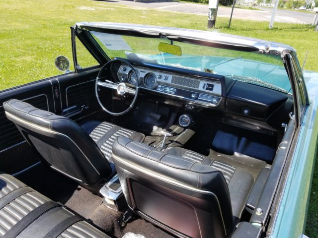 1966 Blue Oldsmobile Cutlass Convertible