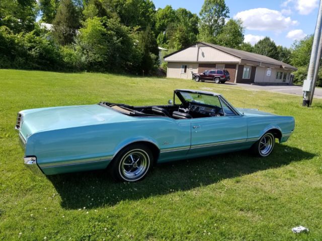 1966 Blue Oldsmobile Cutlass Convertible