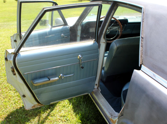 1966 black primer Ford Custom 500 Sedan