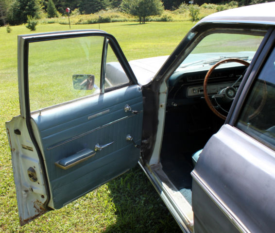 1966 black primer Ford Custom 500 Sedan