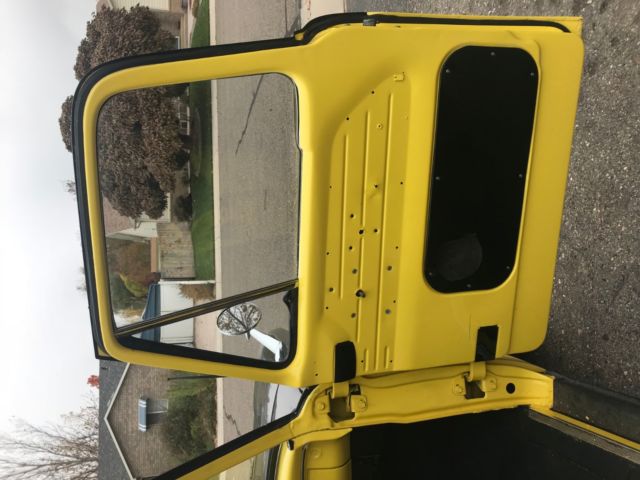 1966 Black and Yellow Ford F-100 Standard Cab Pickup