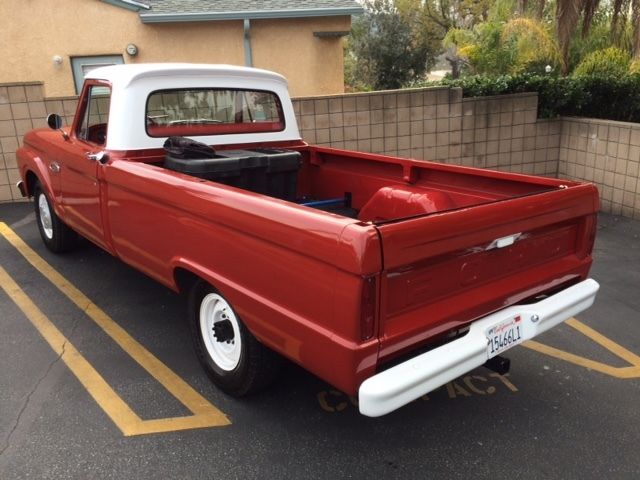 1966 Red with white top Ford F-250 pick up single cab