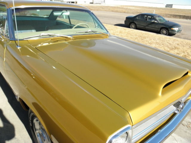 1966 Gold Ford Fairlane hardtop