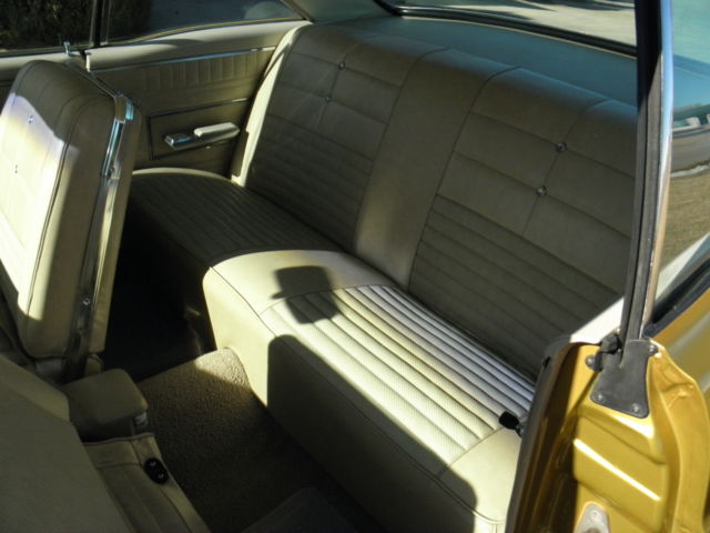 1966 Gold Ford Fairlane hardtop