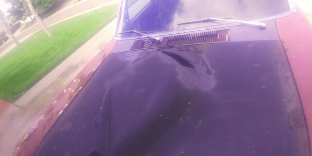 1966 Red Ford Falcon Coupe