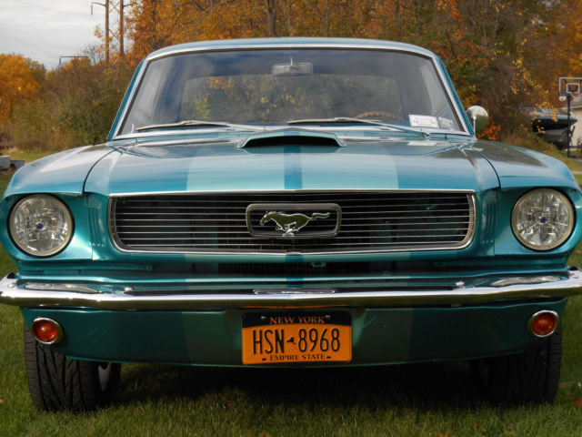 1966 teal Ford Mustang coupe