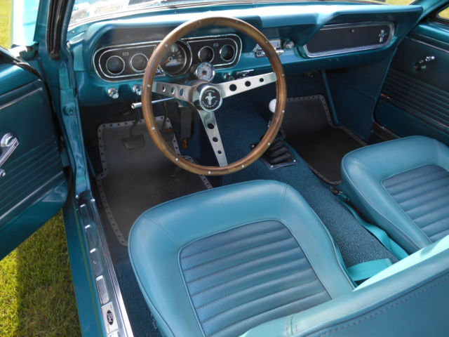1966 teal Ford Mustang coupe