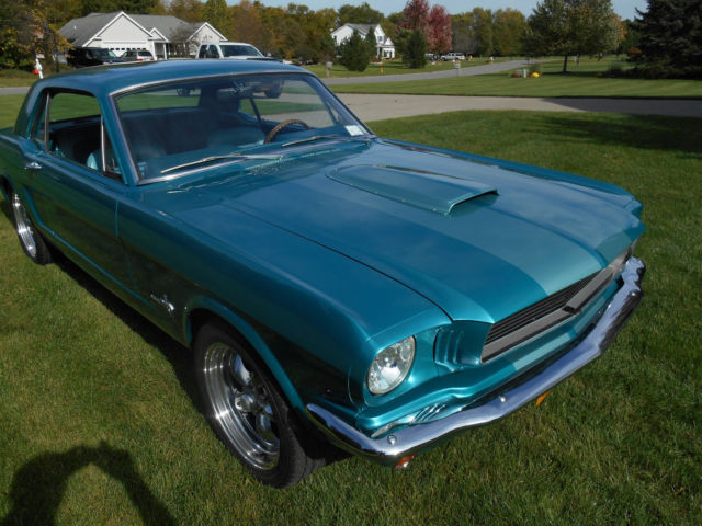 1966 teal Ford Mustang coupe