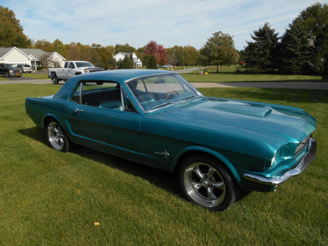 1966 teal Ford Mustang coupe