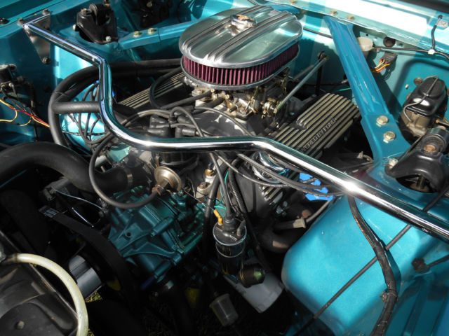 1966 teal Ford Mustang coupe