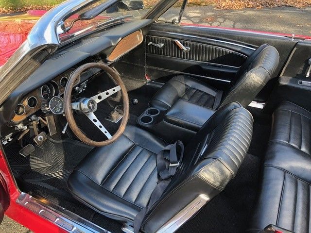 1966 poppy red Ford Mustang Convertible