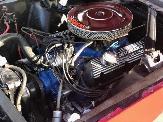 1966 poppy red Ford Mustang Convertible